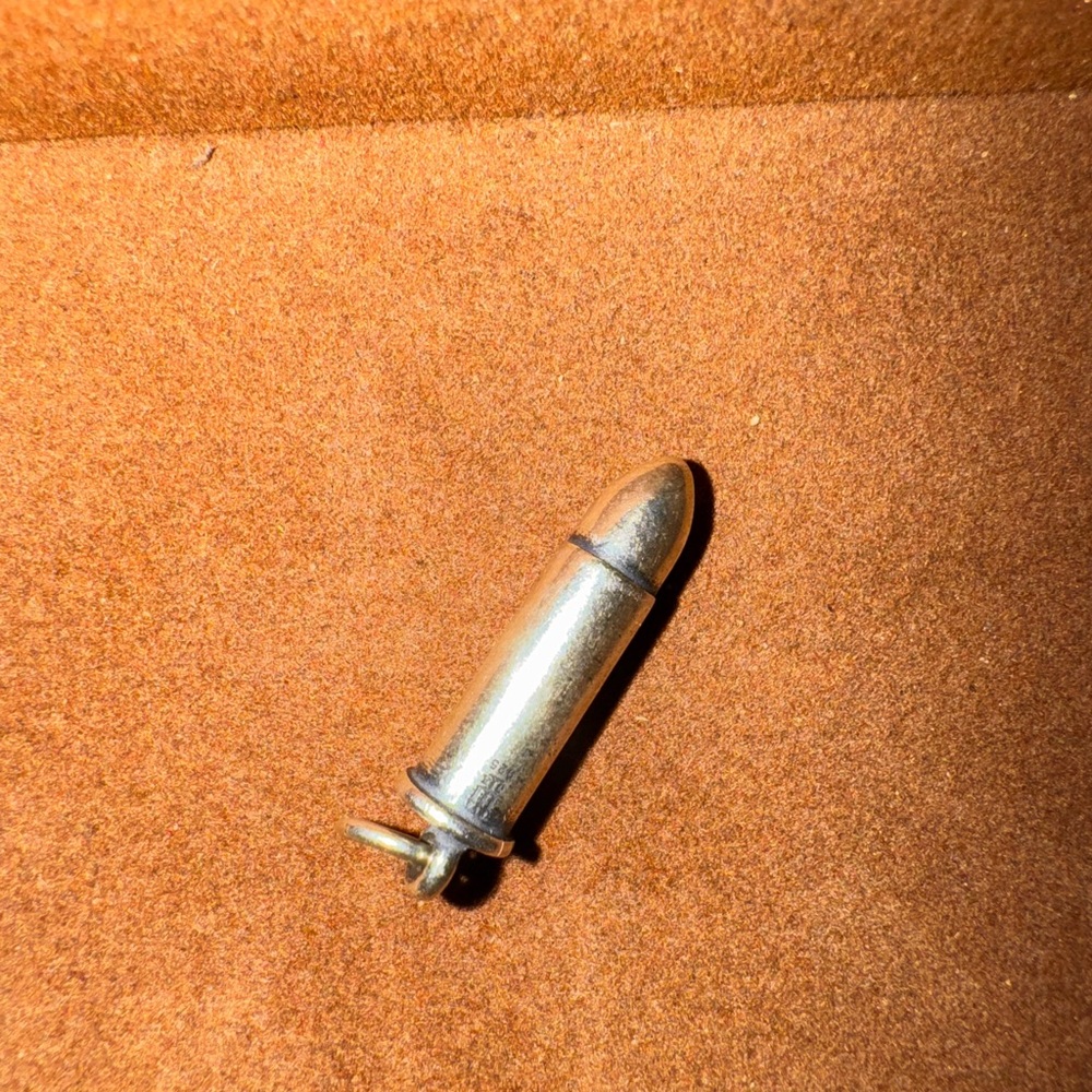 Retired James Avery Silver Bullet Charm